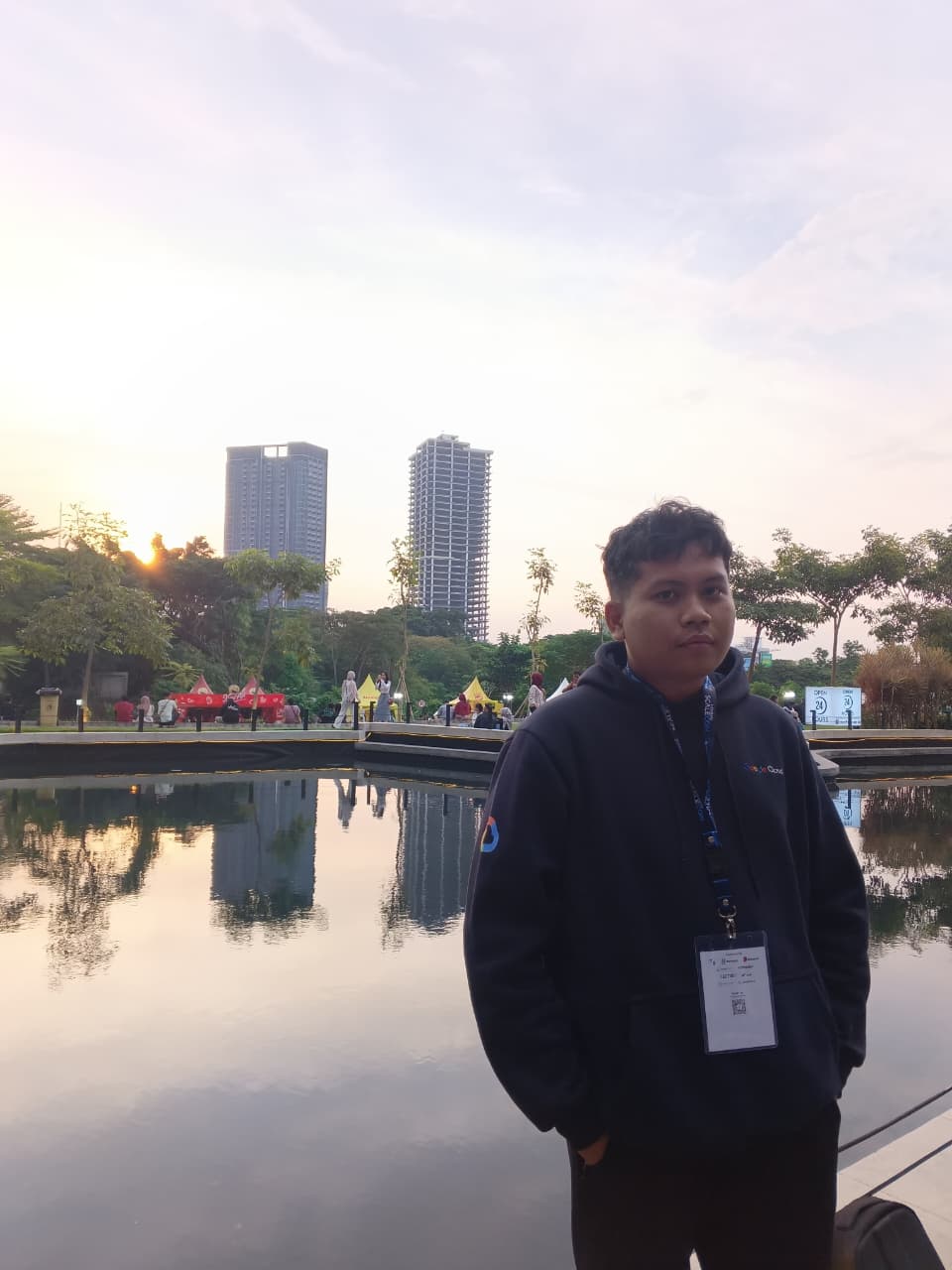 At the event venue with sunset background